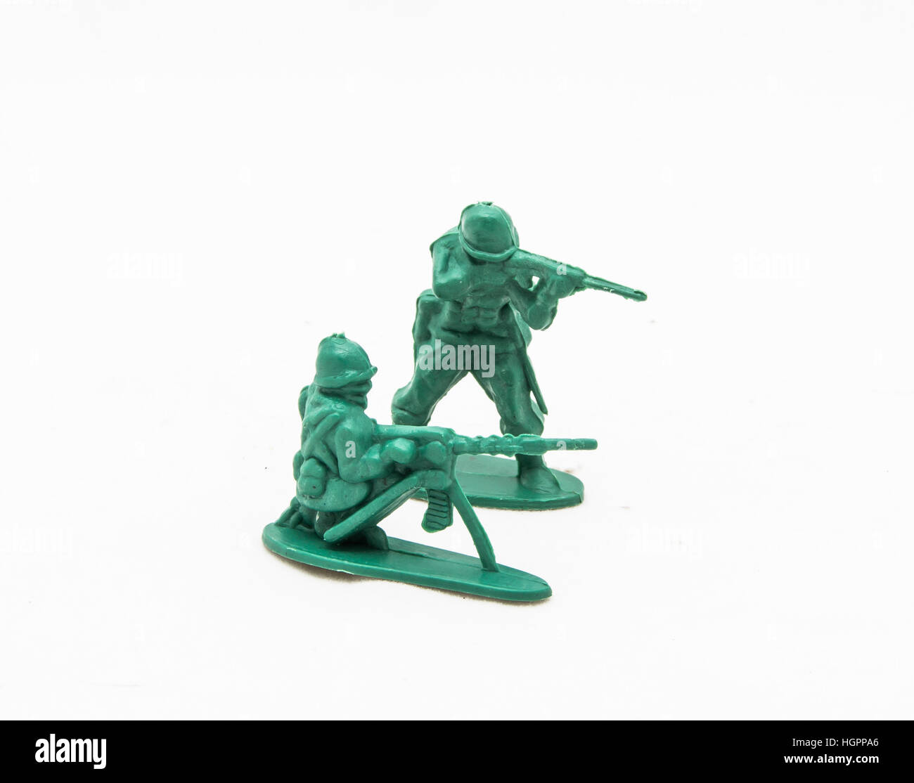 Zwei grüne Kunststoff-Spielzeug-Soldaten Stockfoto