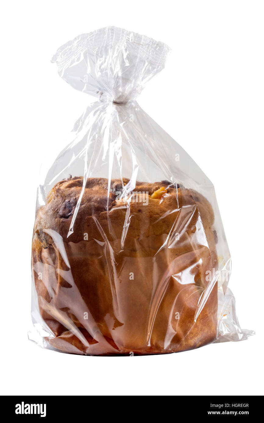 Panettone in Plastiktüte isoliert auf weißem Hintergrund mit Beschneidungspfad enthalten Stockfoto