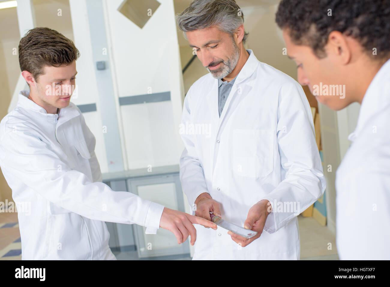 weiße Bluse Arbeitnehmergruppe Stockfoto