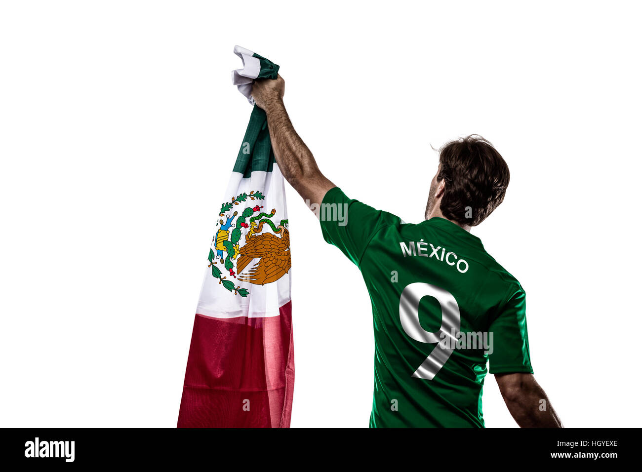 Mexikanischer Fußballspieler, feiert am weißen Backgrond. Stockfoto