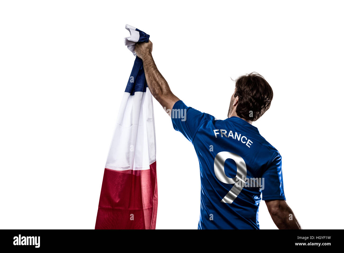 Französischer Fußballspieler, feiern auf dem weißen Hintergrund. Stockfoto