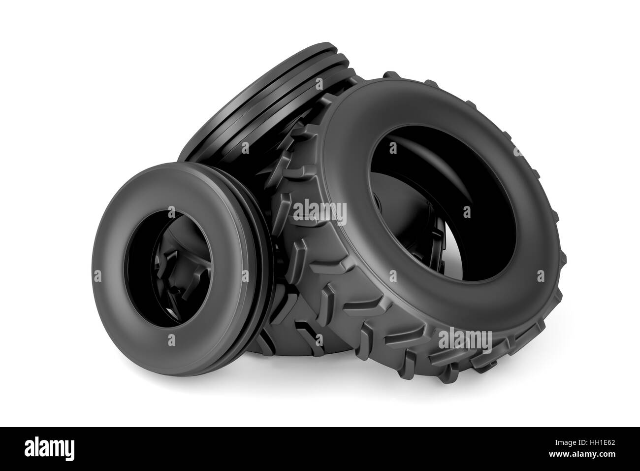 Vordere und hintere Traktorreifen auf weißem Hintergrund Stockfoto