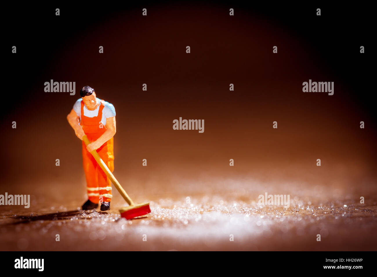 Konzeptbild eines Mannes fegt. Stockfoto