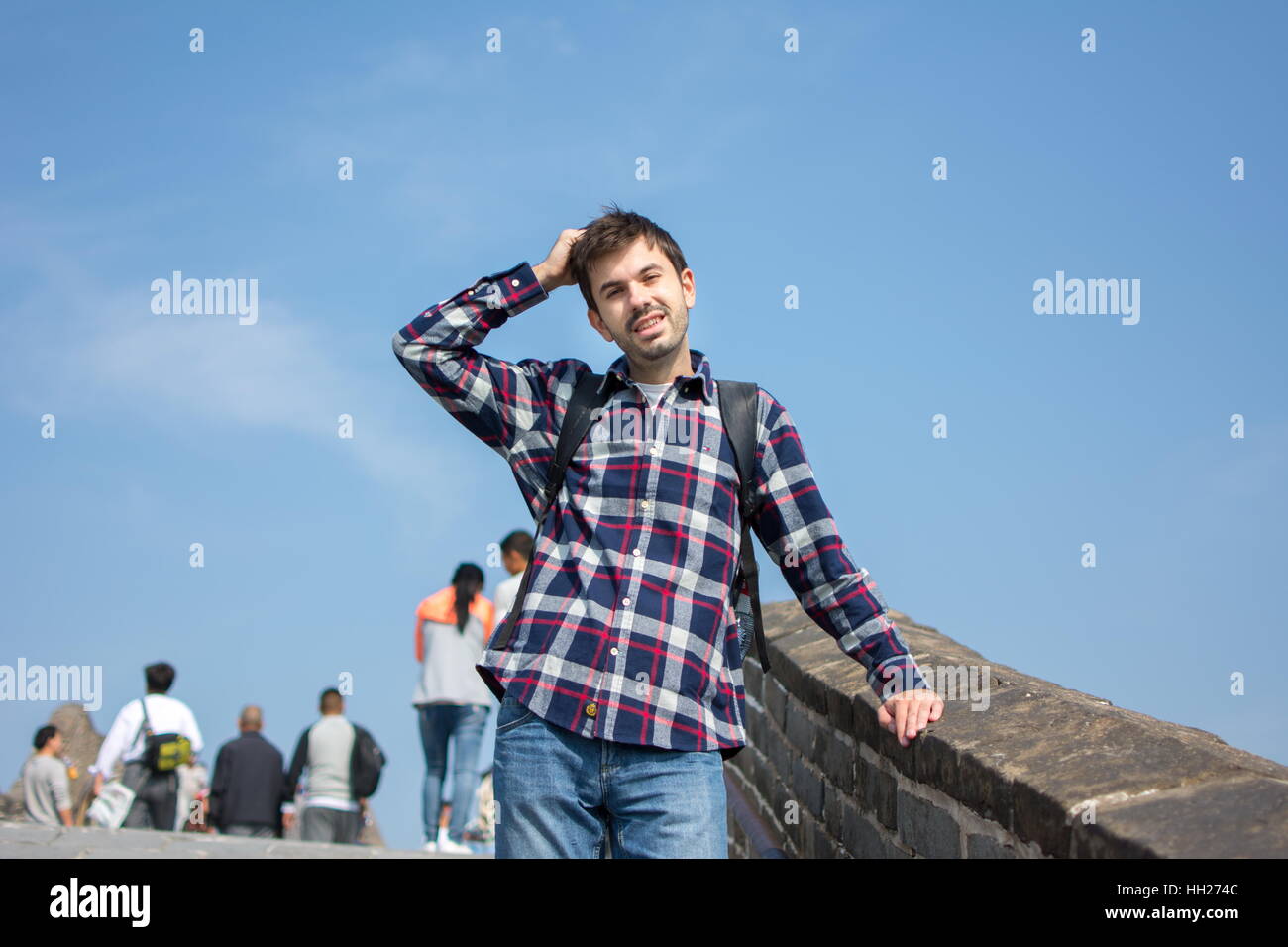Müde Touristen an der chinesischen Mauer Stockfoto