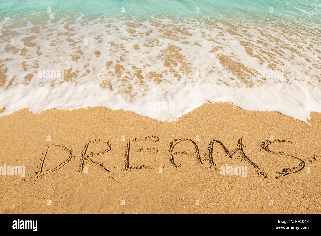 Träume Eintrag am Strand Sand - Urlaub und Reisen-Konzept Stockfoto