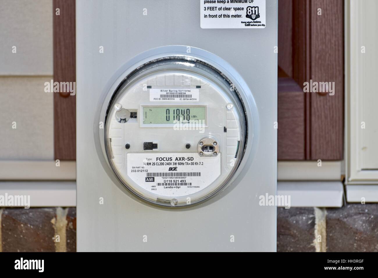 Eine elektrische und Gaszähler auf der Seite ein Wohnhaus Stockfoto