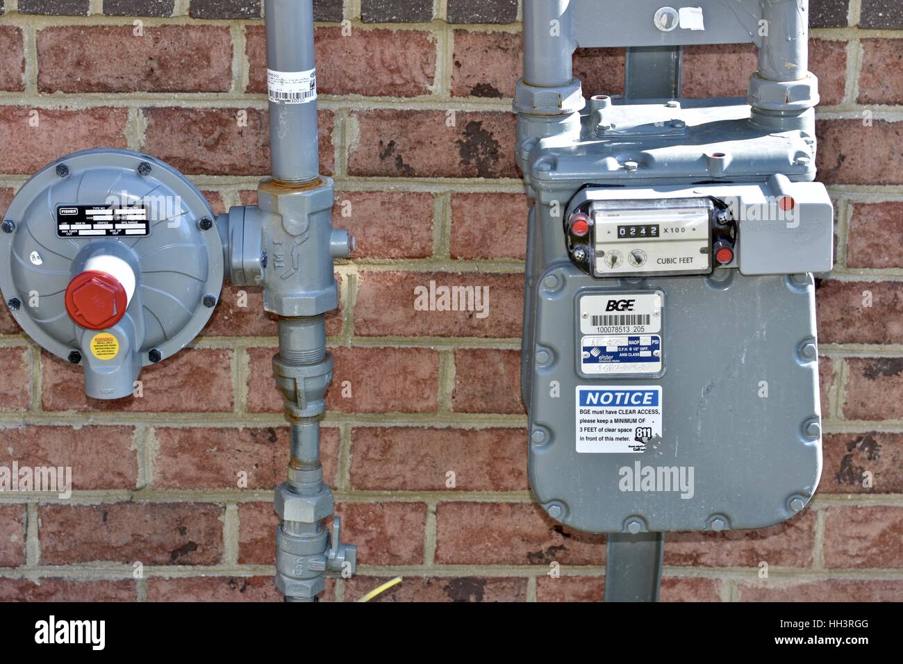 Eine elektrische und Gaszähler auf der Seite ein Wohnhaus Stockfoto