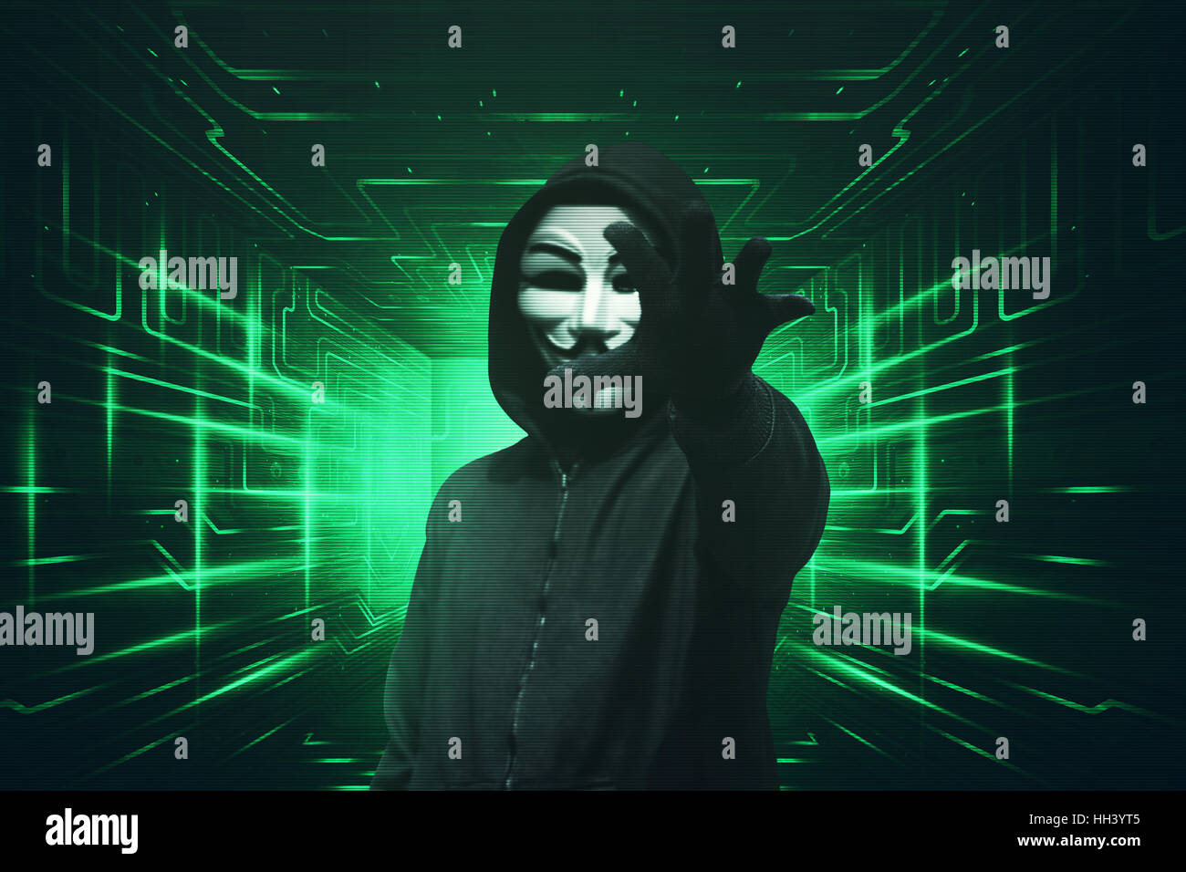 Kapuzen-Hacker mit Maske packte etwas grüne visuellen Hintergrund Stockfoto