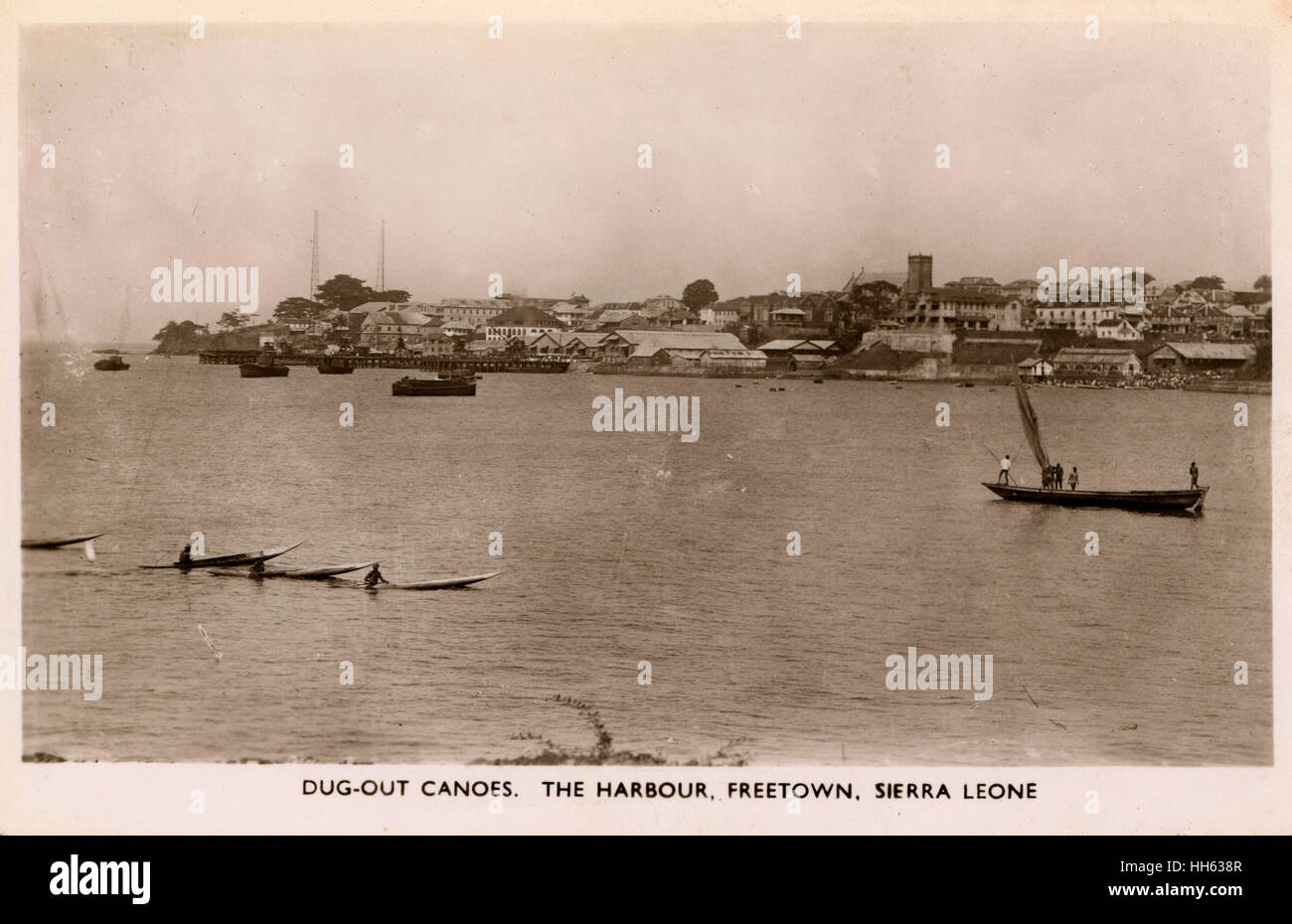 Der Hafen, Freetown, Sierra Leone, Westafrika - Einbaum Kanus. Stockfoto