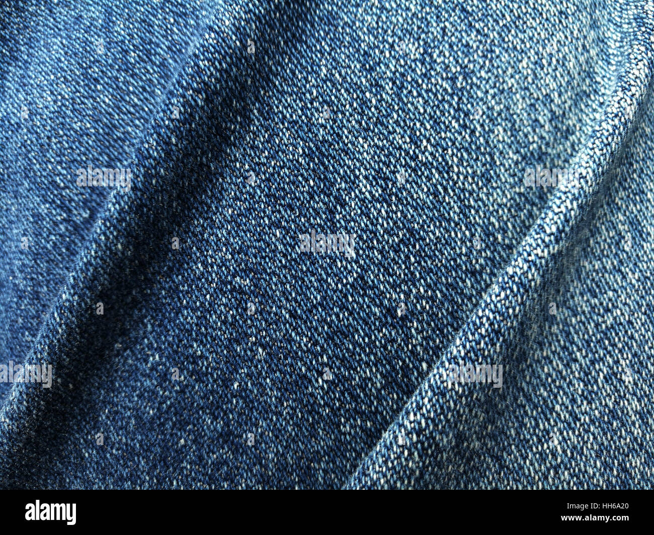 Nahaufnahme von Blue Jeans Denim Falte Hintergrund und Struktur Stockfoto