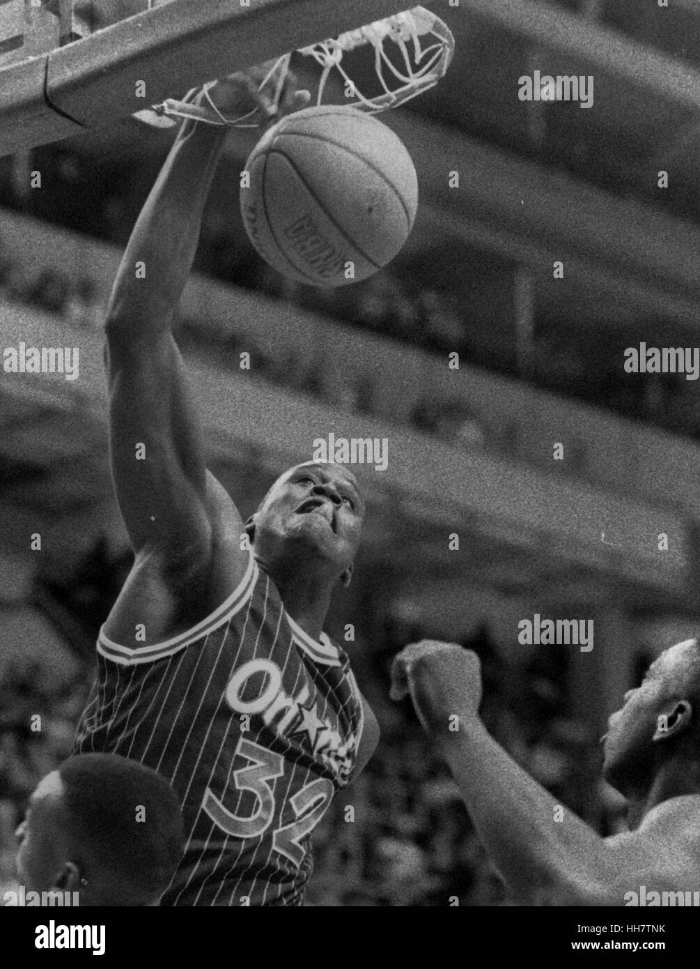 Orlando Magic, Shaquille O'Neal dunks gegen die Boston Celtics im Spiel Aktion Foto von Bill belknap Stockfoto
