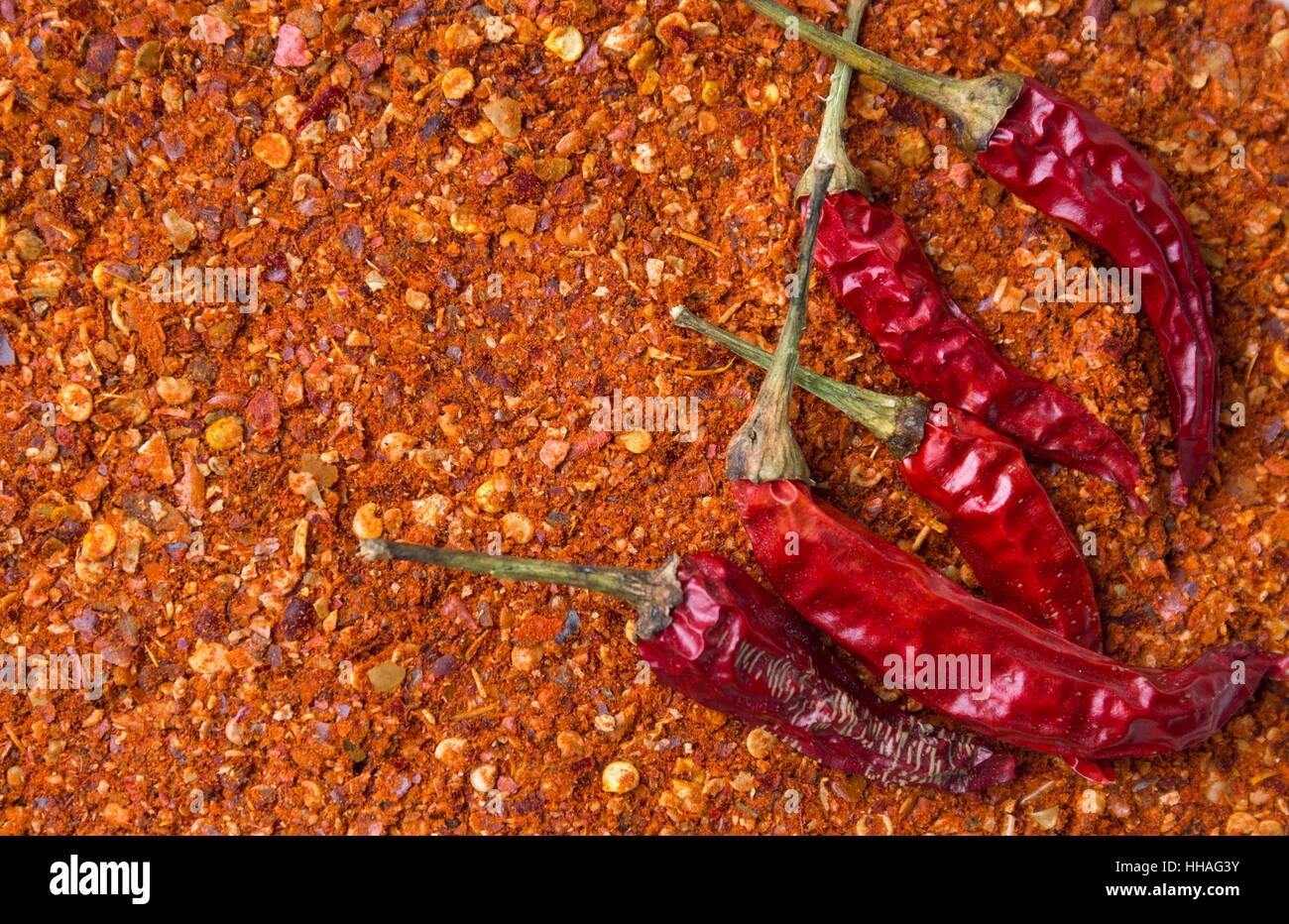 Rote Paprika obenauf gemahlener Paprika Hintergrund Stockfoto