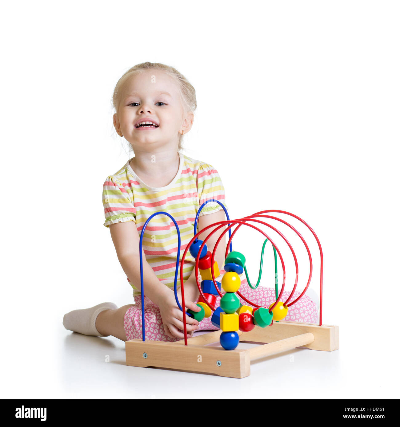 hübsche junge mit Farbe pädagogisches Spielzeug isoliert Stockfoto