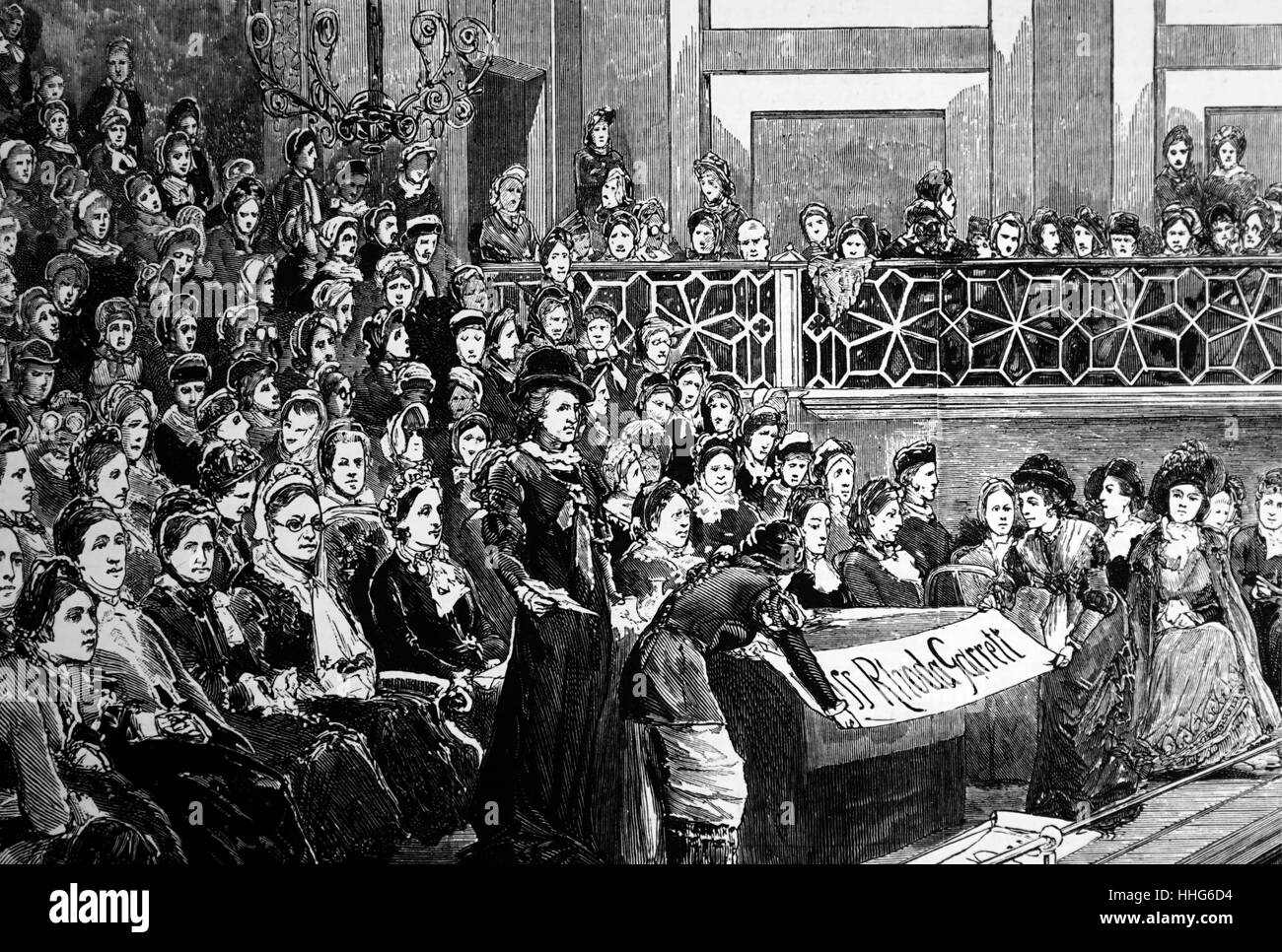 Treffpunkt am St. James Hall, London, um die Ursache für das Frauenwahlrecht zu fördern. Der Lautsprecher ist Rhoda Garrett (1841-1882). Stockfoto