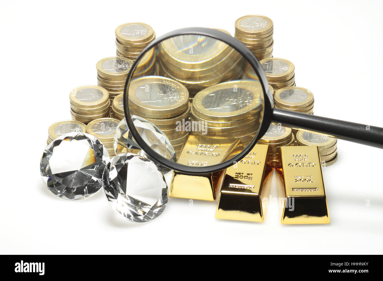 Gold, Diamanten und Euro-Münzen Stockfoto