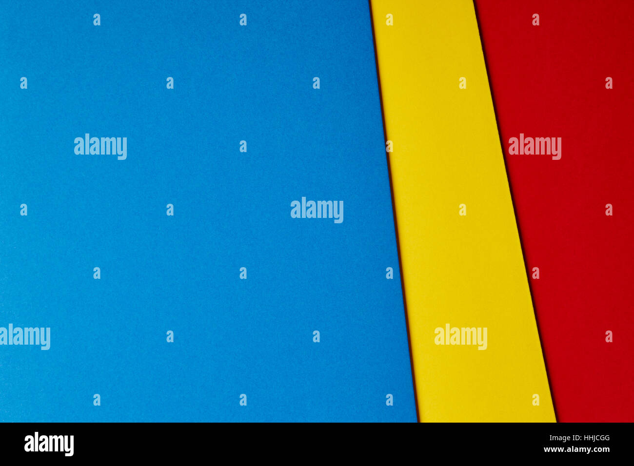 Farbige Pappen Hintergrund in Blau Gelb Rot-Ton. Kopieren Sie Raum. Horizontale Stockfoto Farbige Pappen Hintergrund in Blau Gelb Rot-Ton. Kopieren Sie Raum. Horizontale Stockfoto