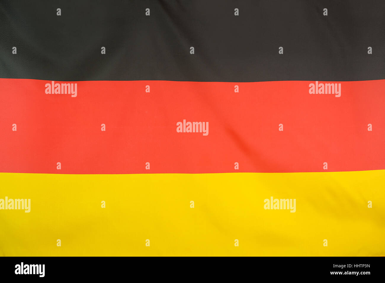 Textile Nationalflagge Deutschlands für Hintergrund Stockfoto