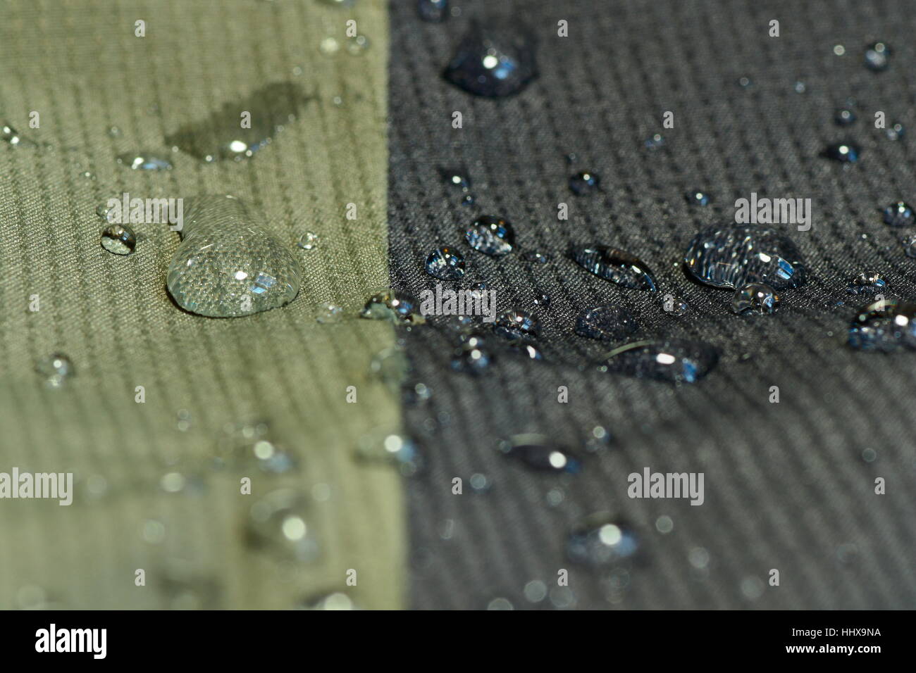 Detail der Wasser abstoßen Textilmaterial, grün und schwarz, flacher Schärfentiefe Stockfoto