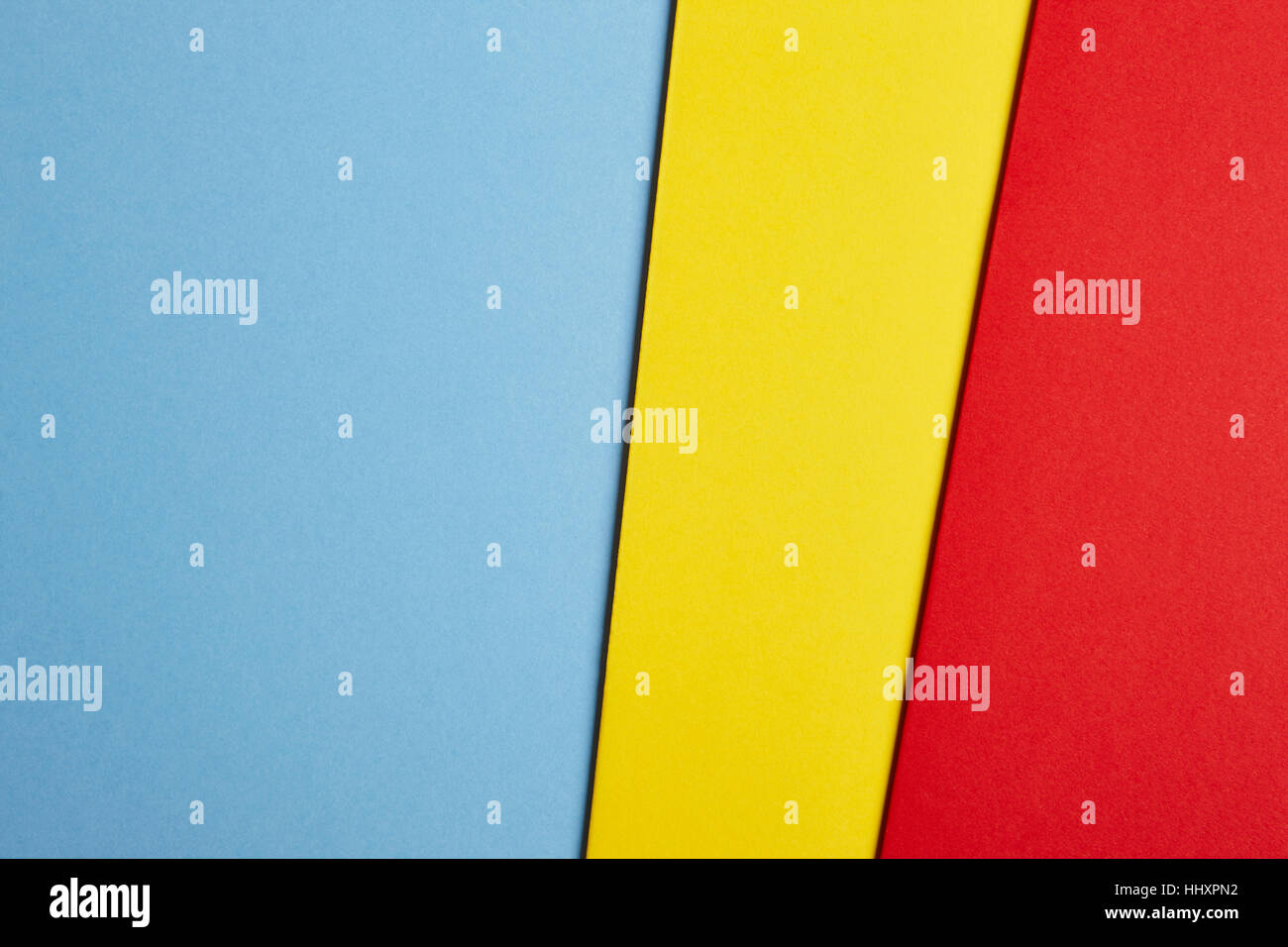 Farbige Pappen Hintergrund in Blau Gelb Rot-Ton. Kopieren Sie Raum. Horizontale Stockfoto Farbige Pappen Hintergrund in Blau Gelb Rot-Ton. Kopieren Sie Raum. Horizontale Stockfoto