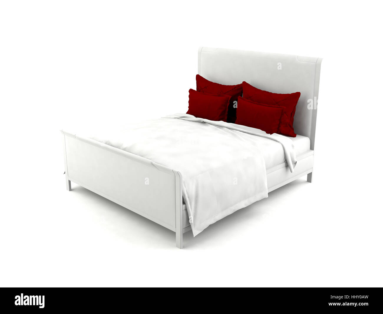 Weißes Bett mit roten Kissen Stockfoto