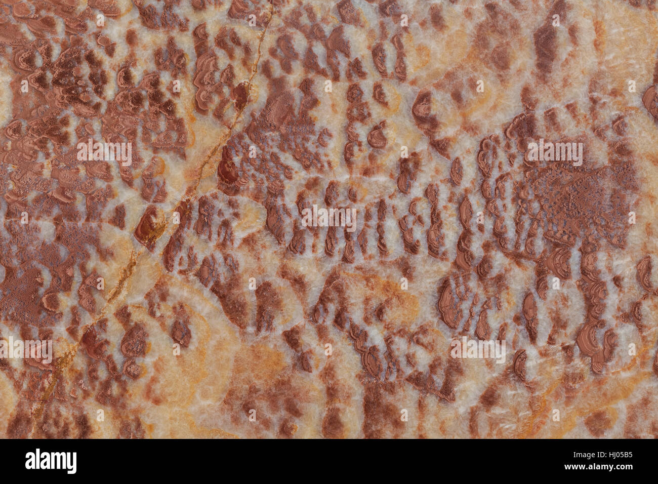 rötliche Marmorfußboden wie ein Hintergrund Stockfoto