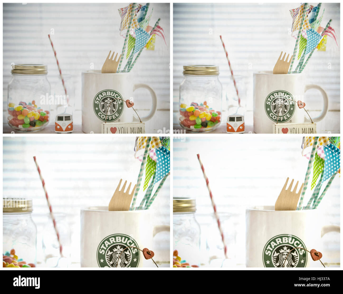 Weiß-Starbucks-Becher mit Starbucks-Logo, VW Camper Van, jellybeans auf weißem Holz Hintergrund. Stockfoto