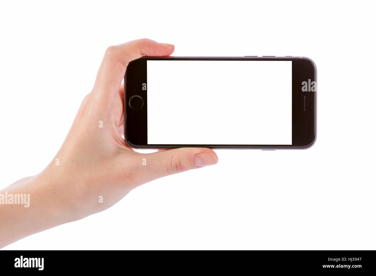 Hand hält Schwarz Smartphone auf weißen Beschneidungspfad innen isoliert Stockfoto