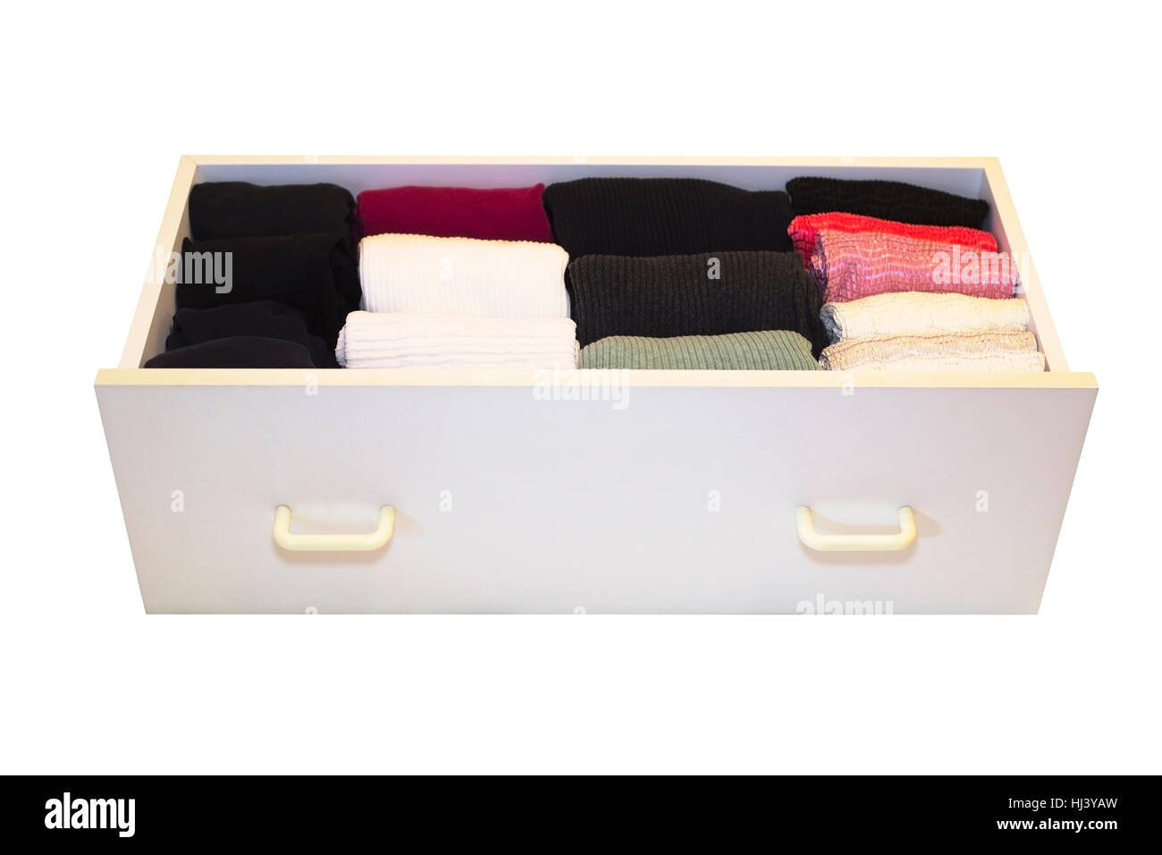 Damen Shirts in einer Büro-Schublade gefaltet in der KonMari-Methode der eigenen Organisation Experte Marie Kondo. Stockfoto