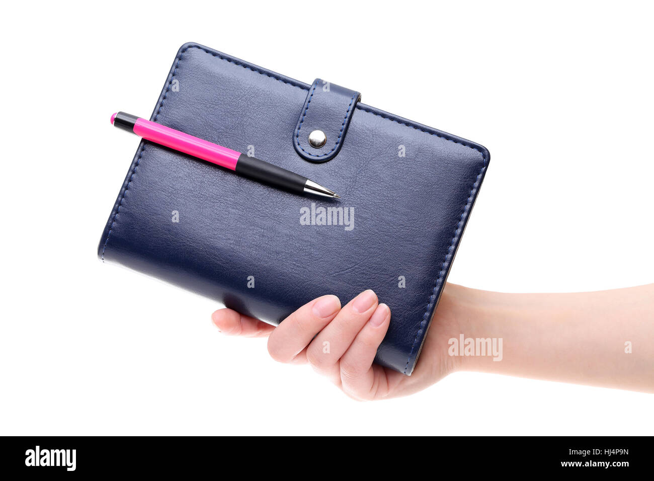 Hand mit blauem Leder Notebook isoliert auf weißem Hintergrund Stockfoto