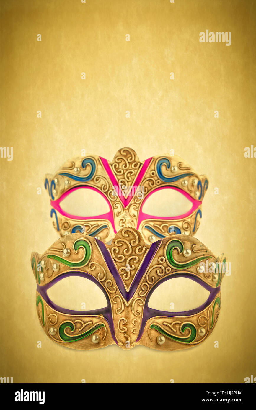 Weibliche Karnevalsmasken auf Vintage-Hintergrund Stockfoto