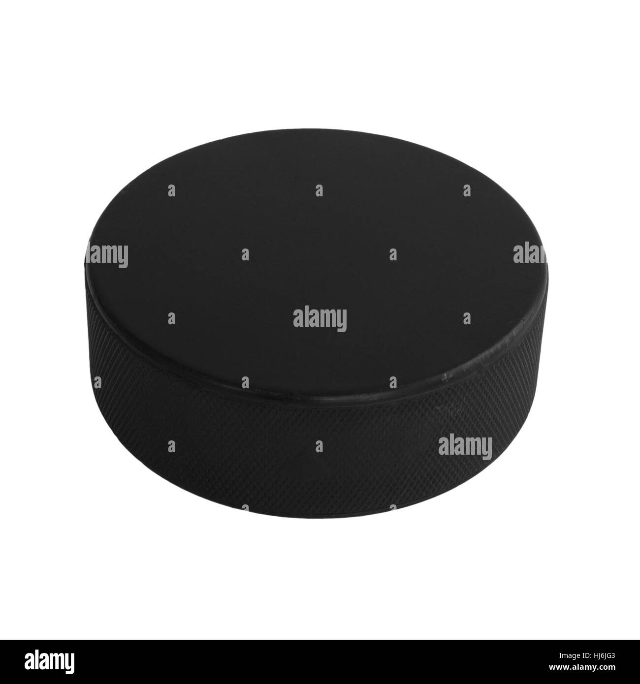 Eine isolierte Hockey-Puck legen flach auf einem weißen Hintergrund. Stockfoto