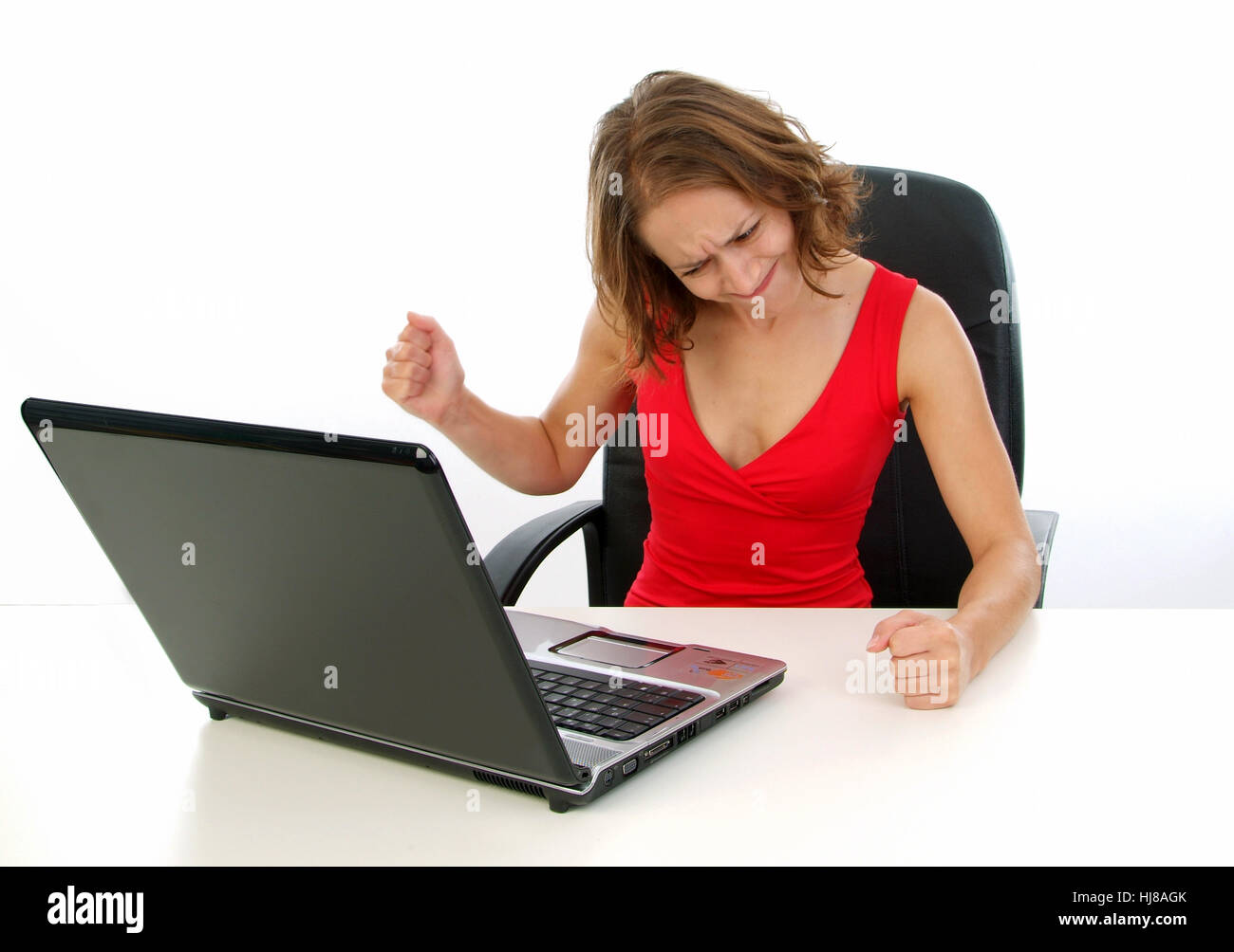 Böse Frau mit laptop Stockfoto