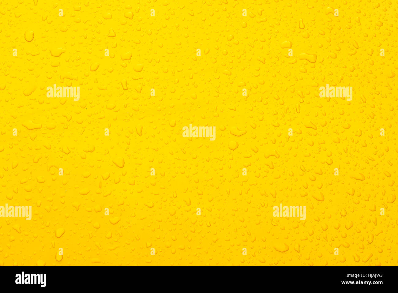 Wasser Tropfen gelb collor Hintergrund Stockfoto