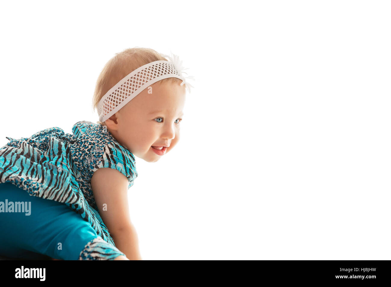 Wunderschönes kleines Mädchen Lächeln während des Spielens Stockfoto