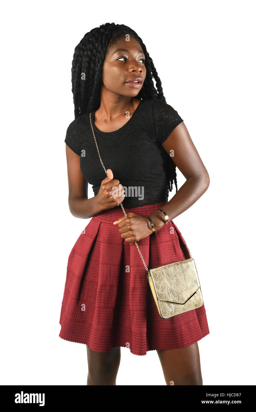 Schöne afrikanische amerikanische Frau mit Handtasche isoliert auf weißem Hintergrund Stockfoto