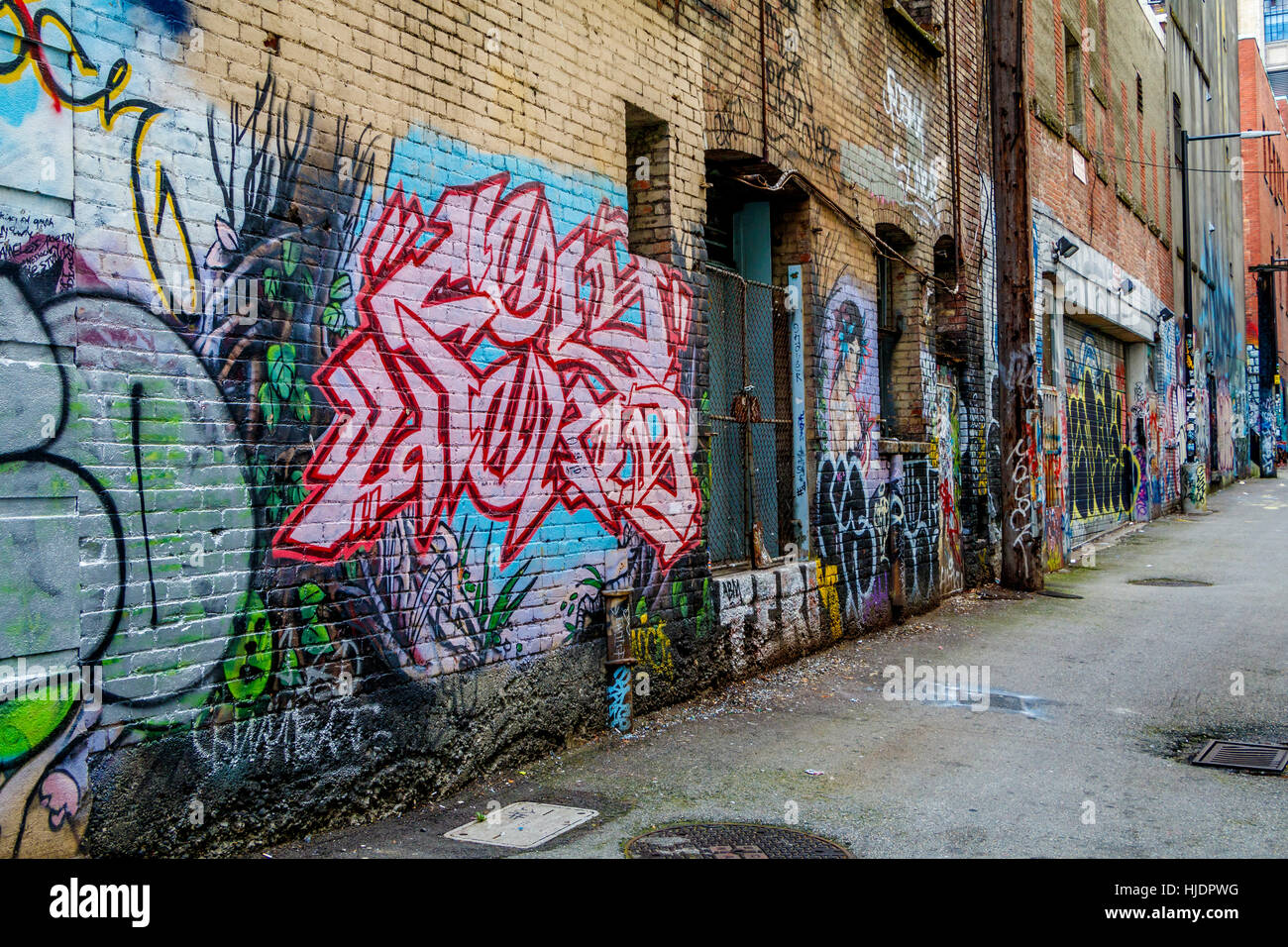 Hintergasse Graffiti an den Wänden in Vancouver, British Columbia, Kanada. Stockfoto