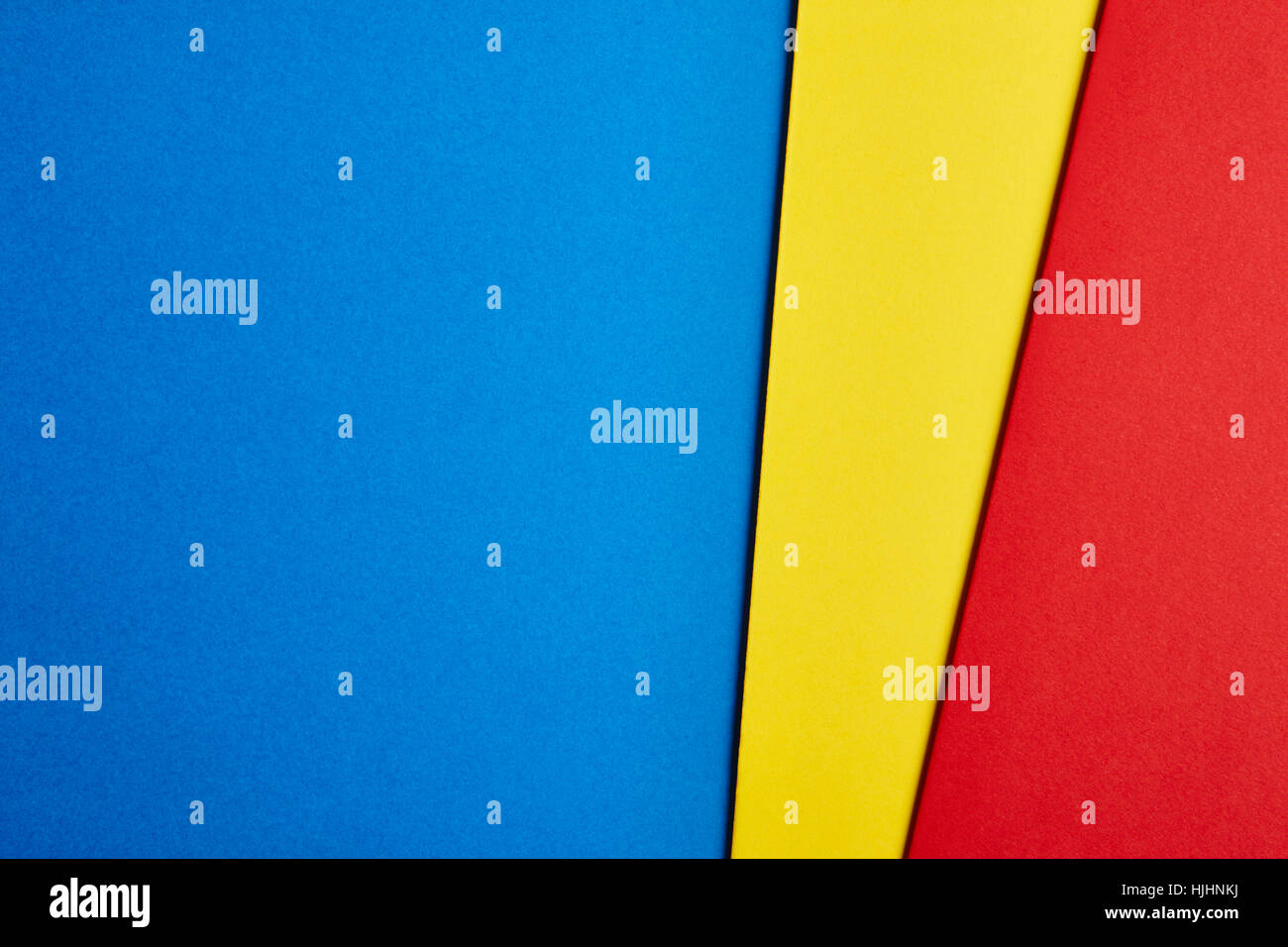 Farbige Pappen Hintergrund in Blau Gelb Rot-Ton. Kopieren Sie Raum. Horizontale Stockfoto Farbige Pappen Hintergrund in Blau Gelb Rot-Ton. Kopieren Sie Raum. Horizontale Stockfoto