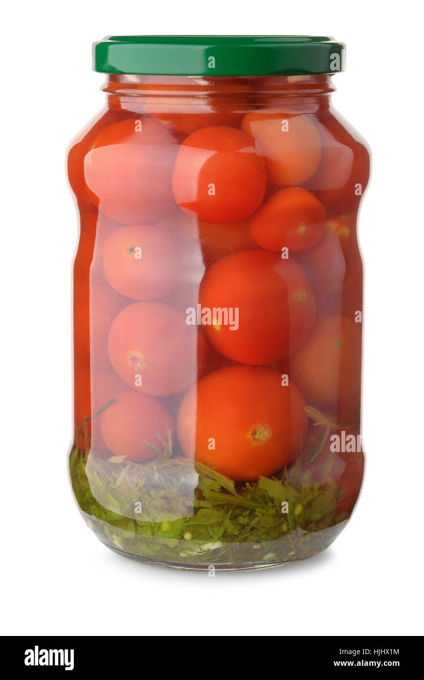 Glas mit eingelegten Tomaten, isoliert auf weiss Stockfoto