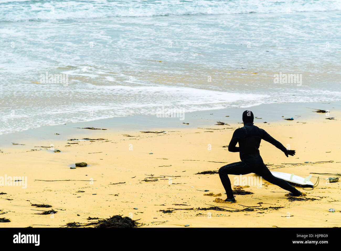Surfen an Watergate, Cornwall. Stockfoto