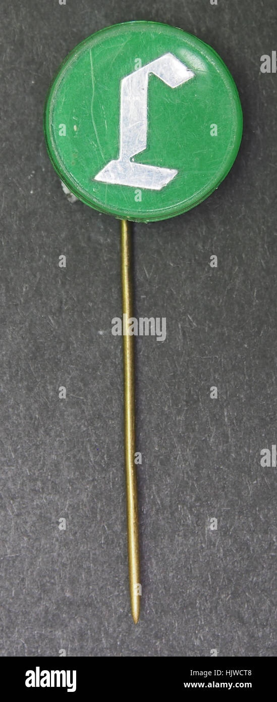 Die Luycks-Werbeschneidnadel ist ein Vintage-Werbeartikel, wahrscheinlich aus dem frühen 20. Jahrhundert, der die Marke Luycks repräsentiert. Diese Pin wurde zu Marketingzwecken verwendet, als solche Sammlerstücke in niederländischen Werbekampagnen üblich waren. Stockfoto