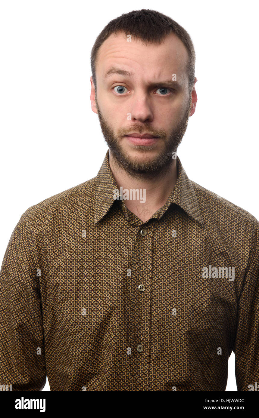 Ernste Jüngling mit angehobenen Augenbraue isoliert auf weiss Stockfoto