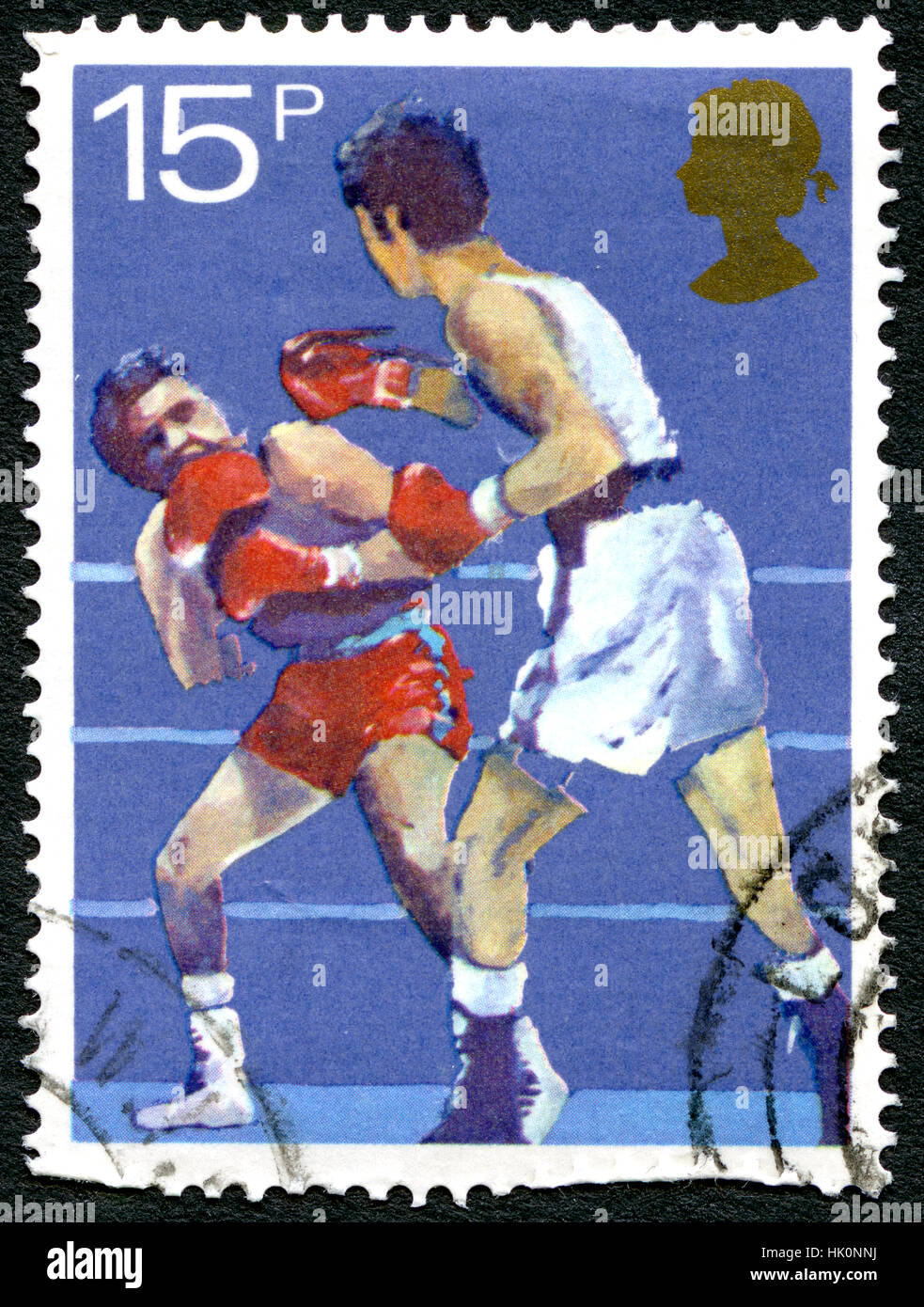 Großbritannien - CIRCA 1980: Eine gebrauchte Briefmarke aus dem Vereinigten Königreich, den Sport des Boxens, circa 1980 feiern. Stockfoto