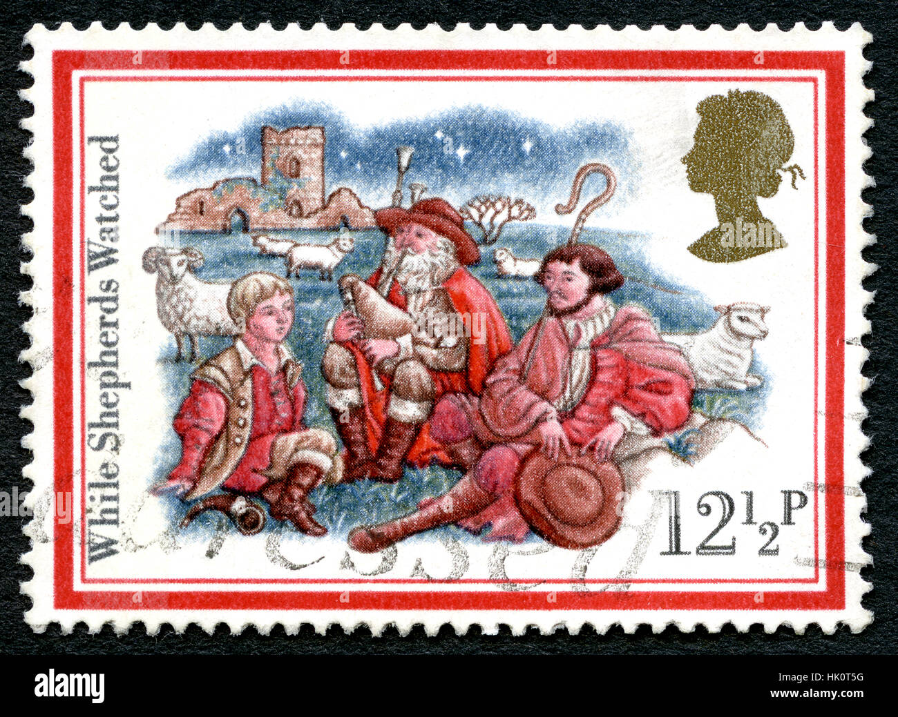 UK - CIRCA 1982: Eine gebrauchte Briefmarke aus dem Vereinigten Königreich, zum Gedenken an Weihnachtslieder mit dem Titel während des Hirten beobachten. Stockfoto
