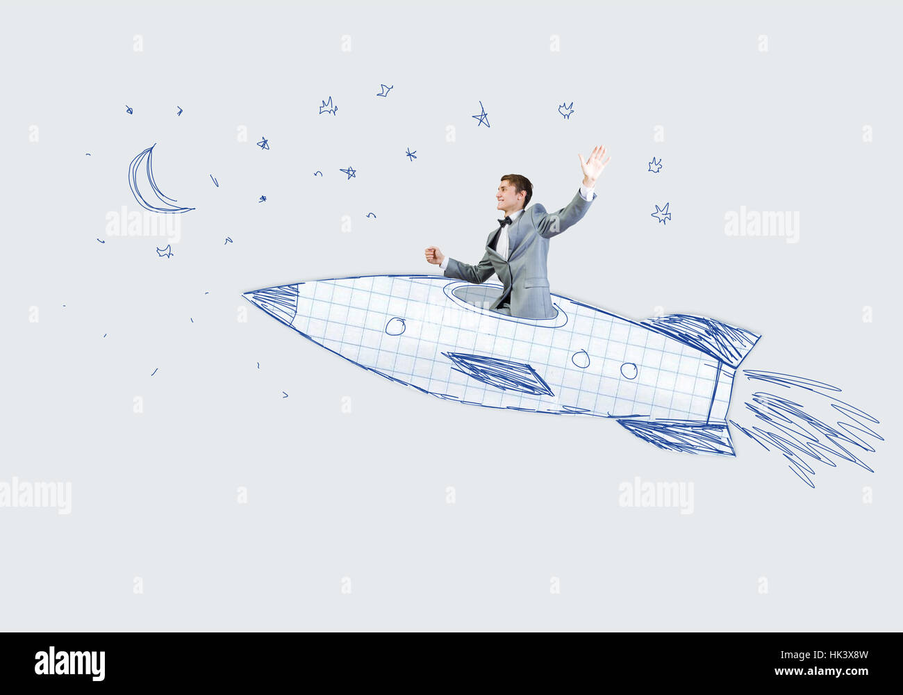 Junger Geschäftsmann Himmel gezeichnete Rakete fliegen Stockfoto