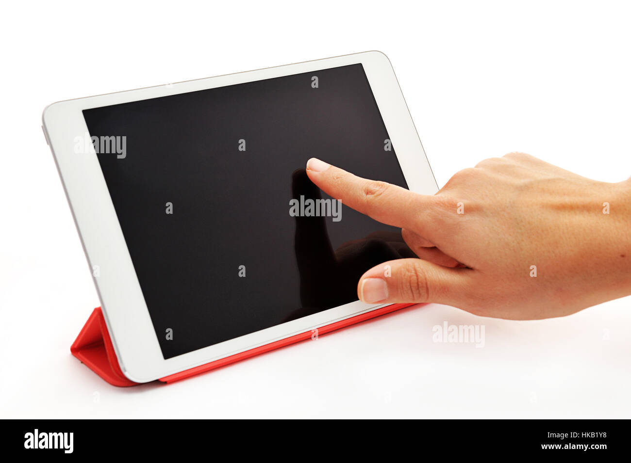 Finger berühren Bildschirm auf Tablet auf weißem Hintergrund Stockfoto
