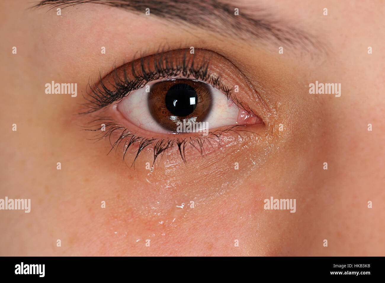Nahaufnahme des Auges mit Tränen Stockfoto