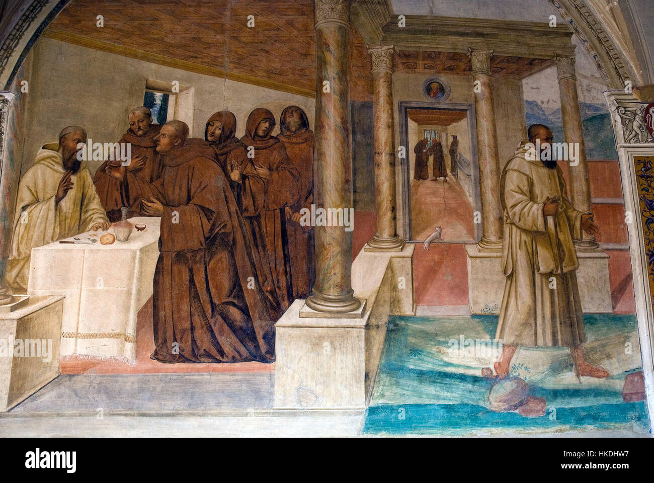 Dieses Gemälde zeigt den dramatischen Moment eines Menschen, der ein vergiftetes Glas mit dem Zeichen des Kreuzes bricht, ein symbolischer Akt des Schutzes und des Widerstands. Sie reflektiert historische religiöse Themen und konzentriert sich auf spirituelle Stärke angesichts der Gefahr. Stockfoto