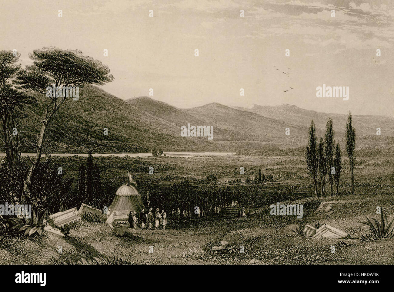 Christopher Wordsworths Gemälde „die Plains of Olympia“ aus dem Jahr 1882 zeigt die ruhige und weite Landschaft von Olympia und fängt die natürliche Schönheit und die historische Bedeutung der antiken Stätte ein. Das Gemälde reflektiert Wordsworths Fokus auf klassische Themen und Landschaften, inspiriert vom antiken Griechenland. Stockfoto