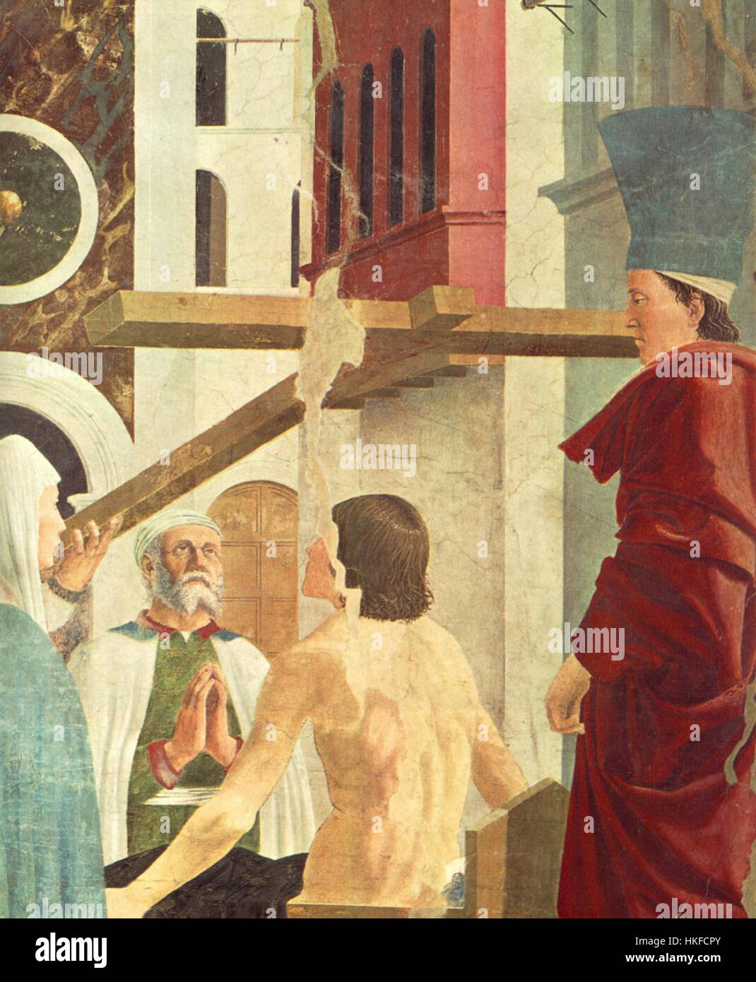 Dieses Fresko aus dem 14. Jahrhundert von Piero della Francesca zeigt die Entdeckung und den Beweis des wahren Kreuzes, eine ikonische Szene aus christlicher Tradition, die Pieros Meisterschaft der Perspektive und der klassischen Komposition zeigt. Stockfoto