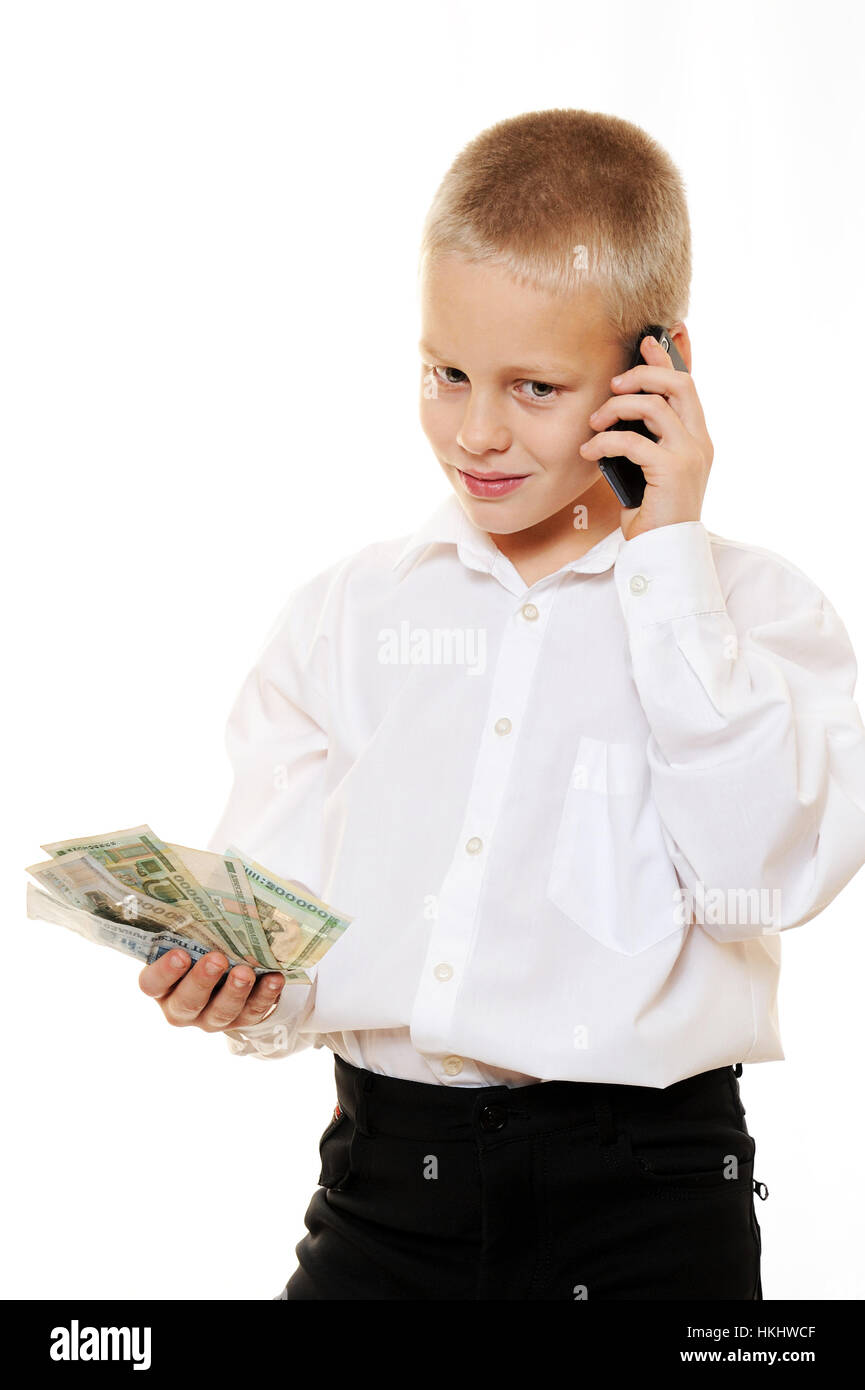 Kind junge Chef mit Telefon und Geld isoliert weiß Stockfoto